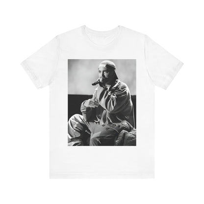 A black graphic t-shirt featuring a black and white graphic of Eminem as a 'Rap Messiah'.