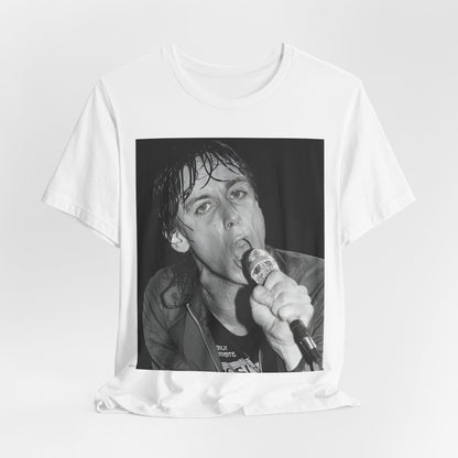 A black graphic t-shirt featuring a 70s graphic or photo of Iggy Pop performing in a wild concert.