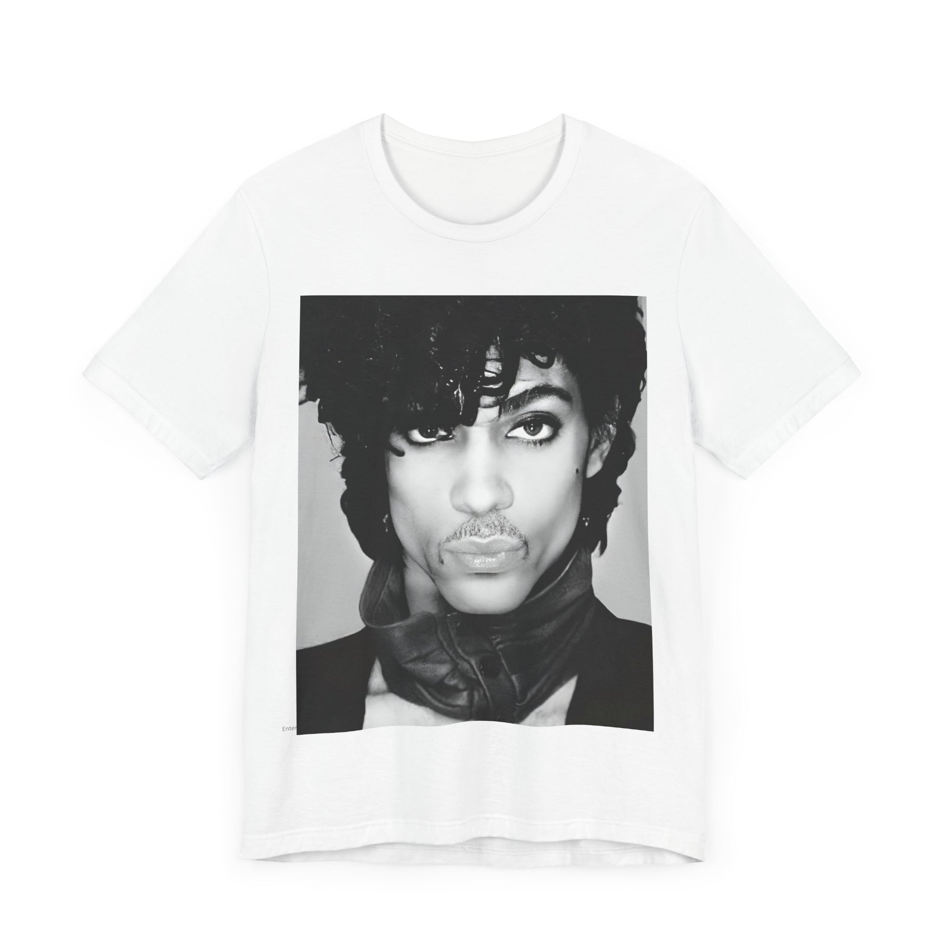 A black graphic t-shirt featuring a black and white photo portrait of Prince.