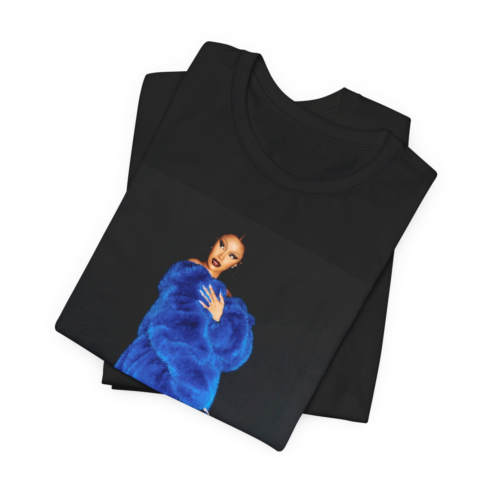 A black graphic t-shirt featuring a photo of Cardi B, possibly with blue velvet elements or a luxurious blue aesthetic.