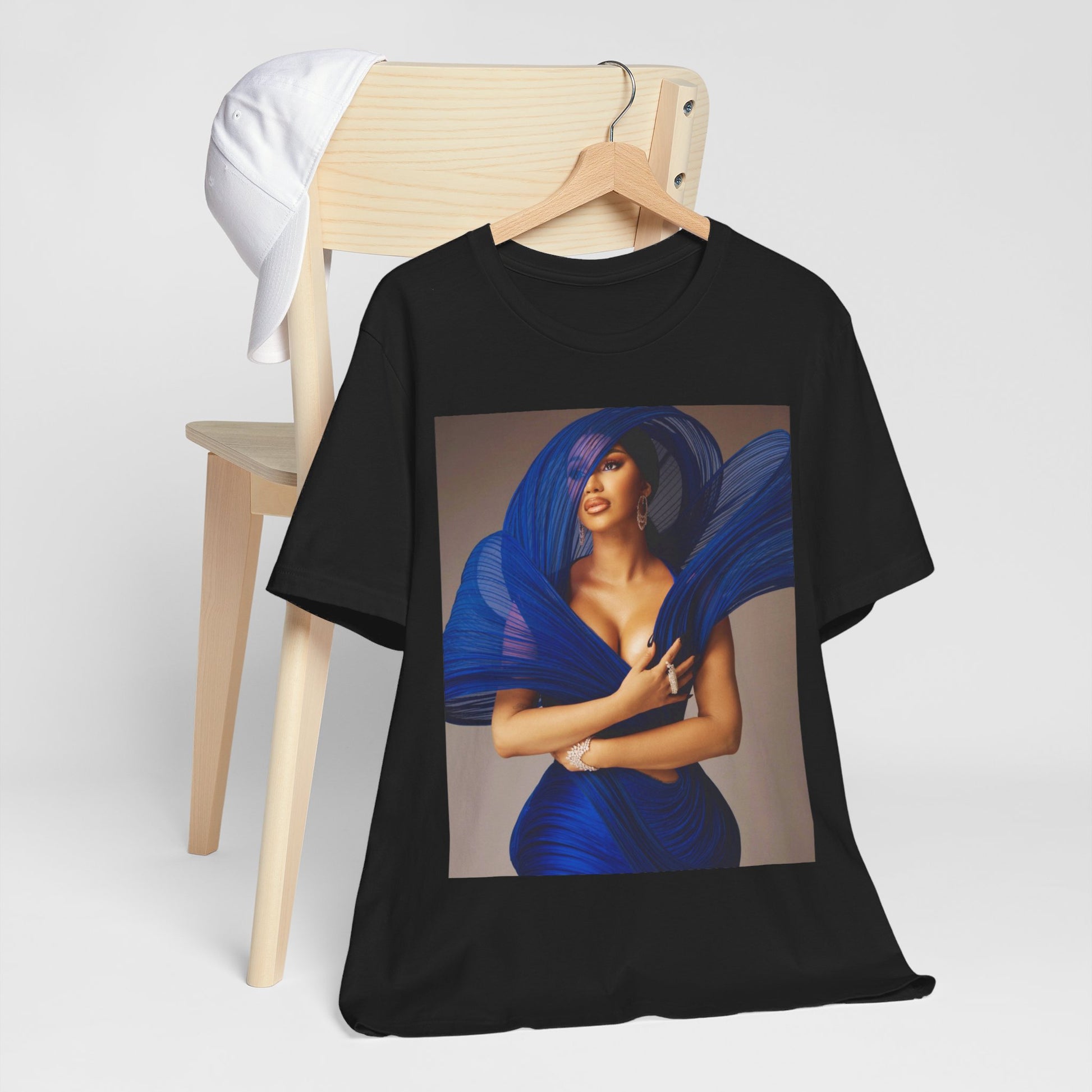 A black graphic t-shirt featuring a graphic of Cardi B in a powerful stance.