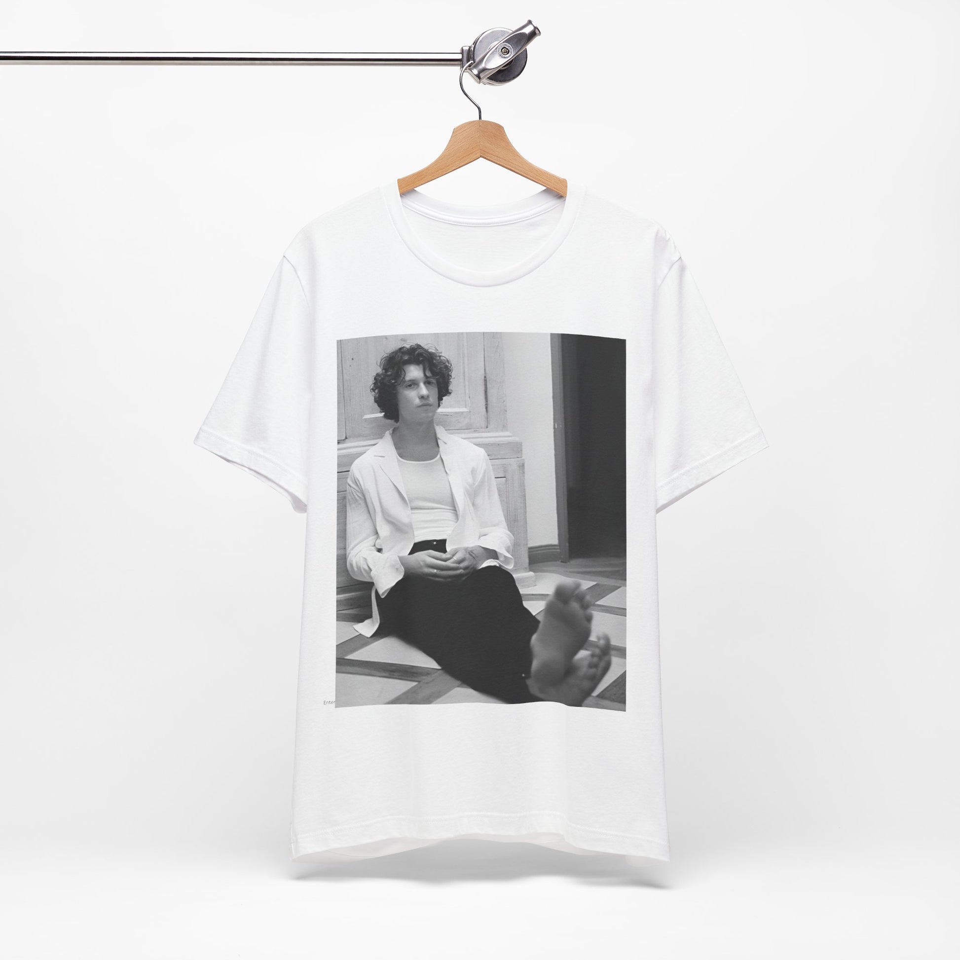 A black graphic t-shirt featuring a vintage casual style graphic of Shawn Mendes.