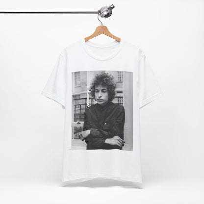 A black graphic t-shirt featuring a black and white graphic of Bob Dylan from the folk revival era.