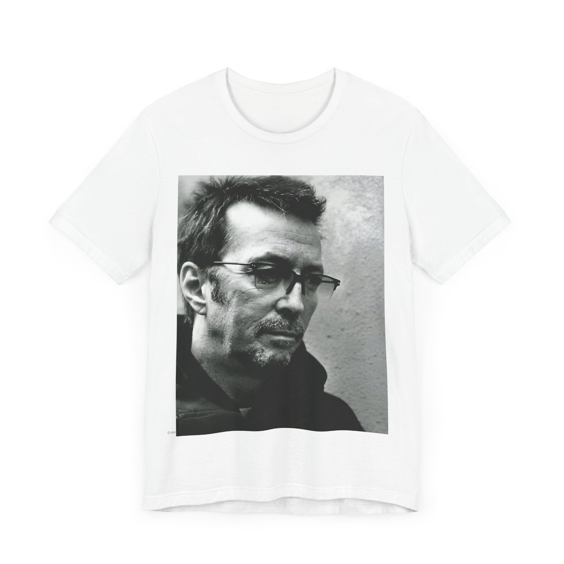 A black graphic t-shirt featuring a black and white, monochrome graphic or photo of Eric Clapton.