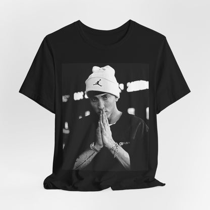 A black graphic t-shirt featuring a black and white portrait photo of Eminem.