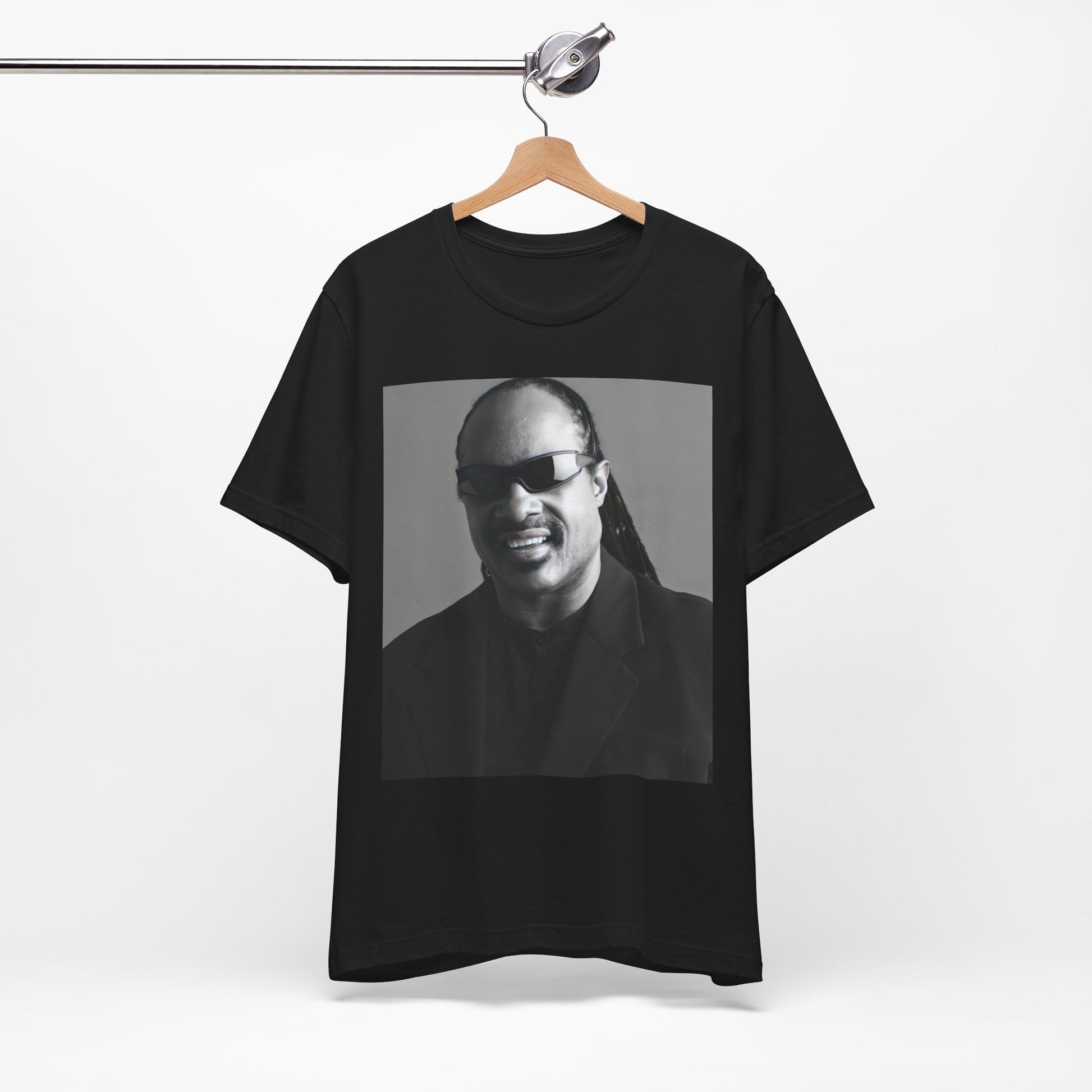 A black graphic t-shirt featuring a classic Motown legend black and white graphic of Stevie Wonder.