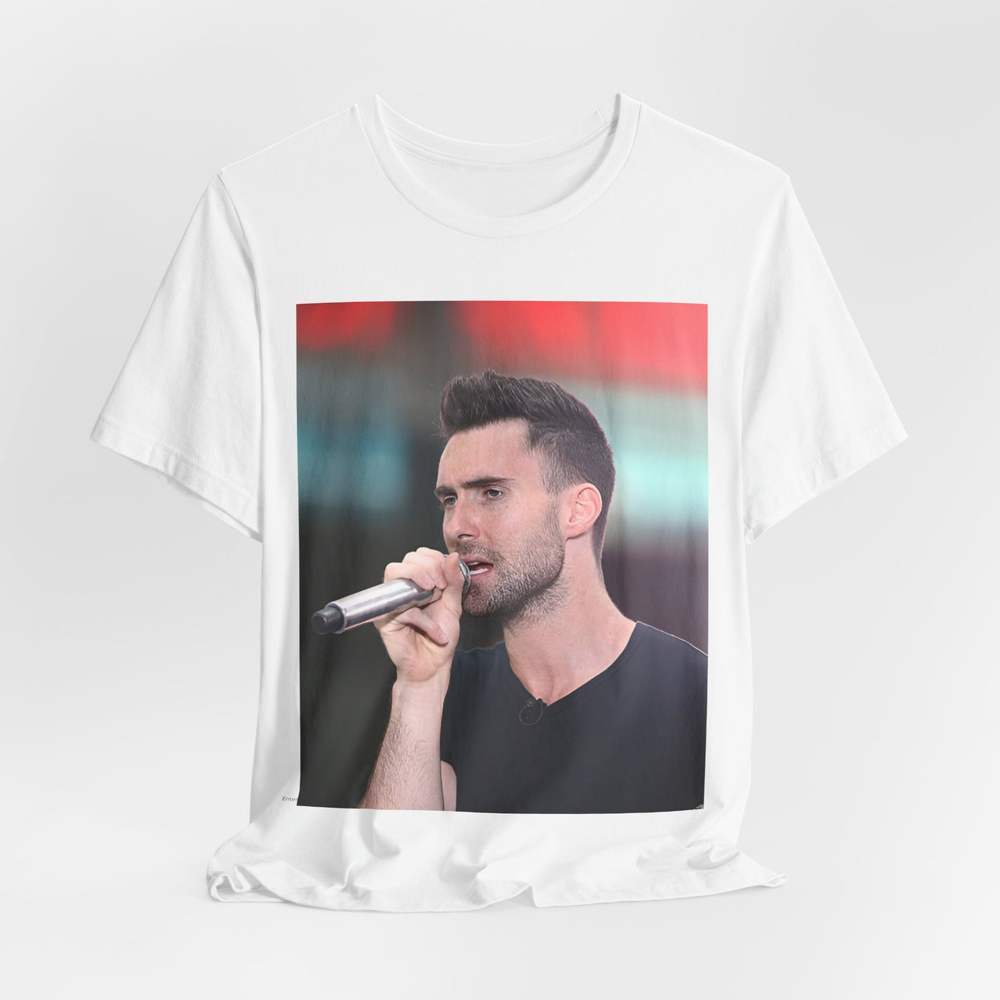 A stylized graphic inspired by the Maroon 5 song "Moves Like Jagger," with funky, retro design elements, on a t-shirt.