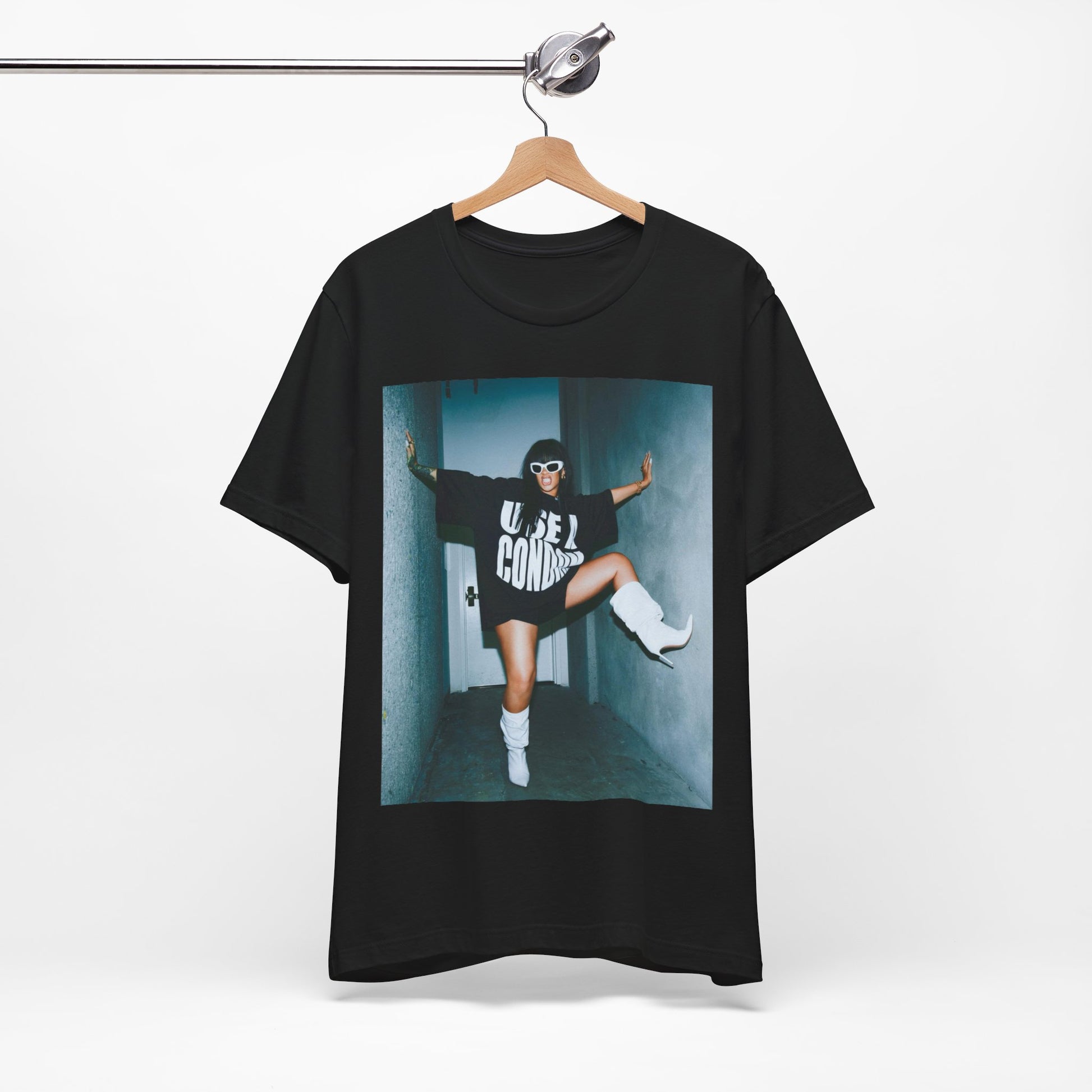 A black graphic t-shirt featuring a modern pop essential graphic of Rihanna.