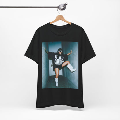 A black graphic t-shirt featuring a modern pop essential graphic of Rihanna.