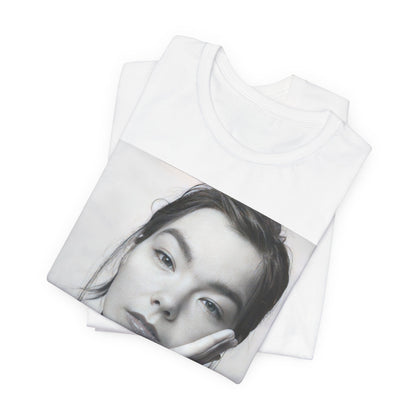 A black graphic t-shirt featuring a graphic related to Bjork's 'Post' album era, possibly with album art elements.