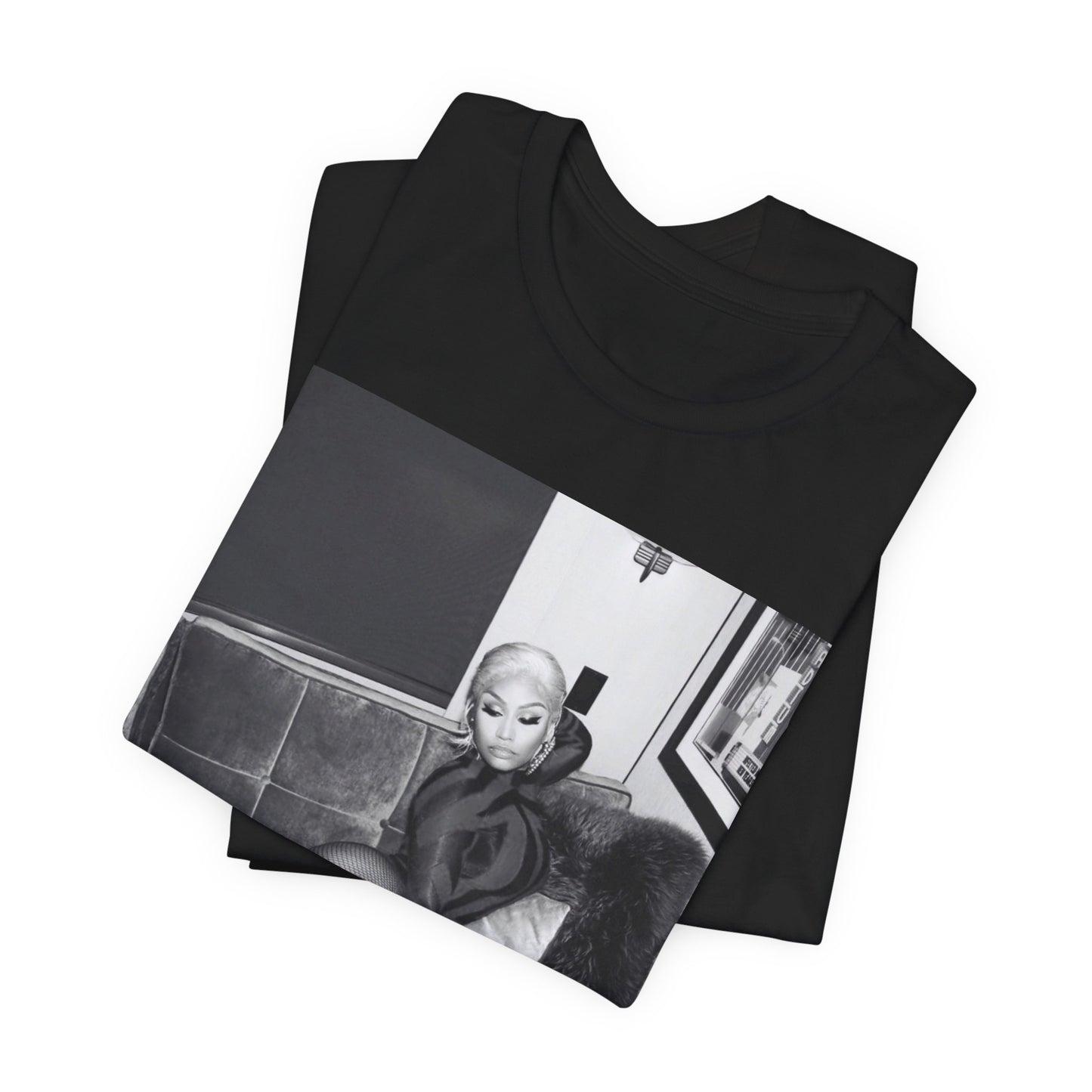 A black graphic t-shirt featuring a fierce black and white glamour graphic of Nicki Minaj.