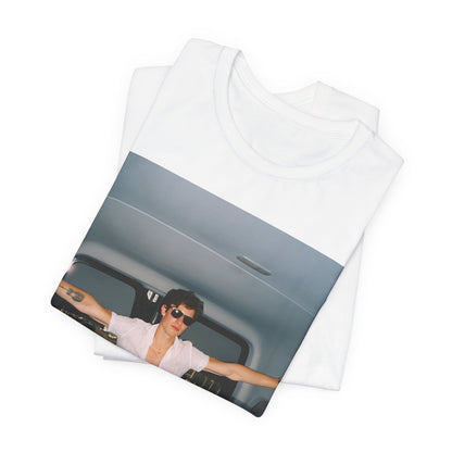 A black graphic t-shirt featuring a graphic of Shawn Mendes with a classic confident look.