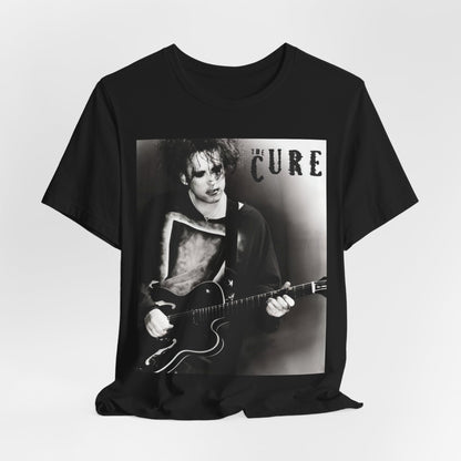 A black graphic t-shirt featuring a vintage goth rock graphic of The Cure.