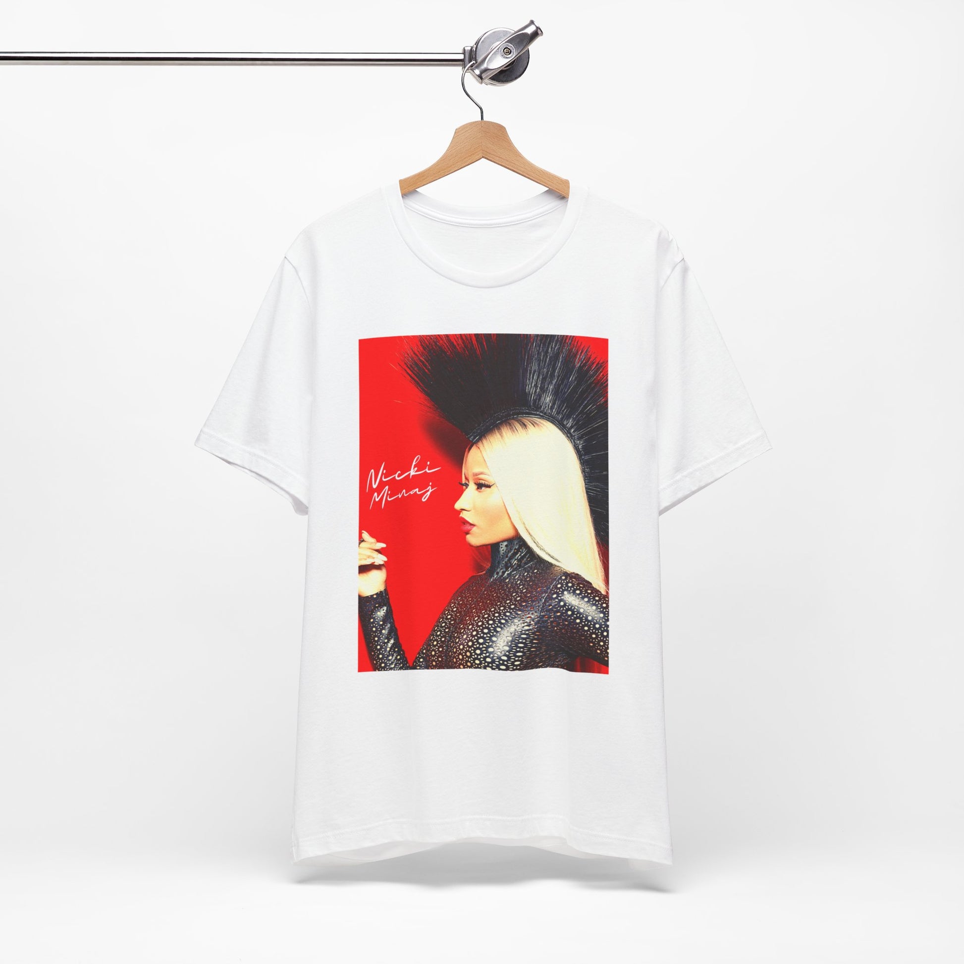 A black graphic t-shirt featuring a graphic of Nicki Minaj as a female rap pioneer.