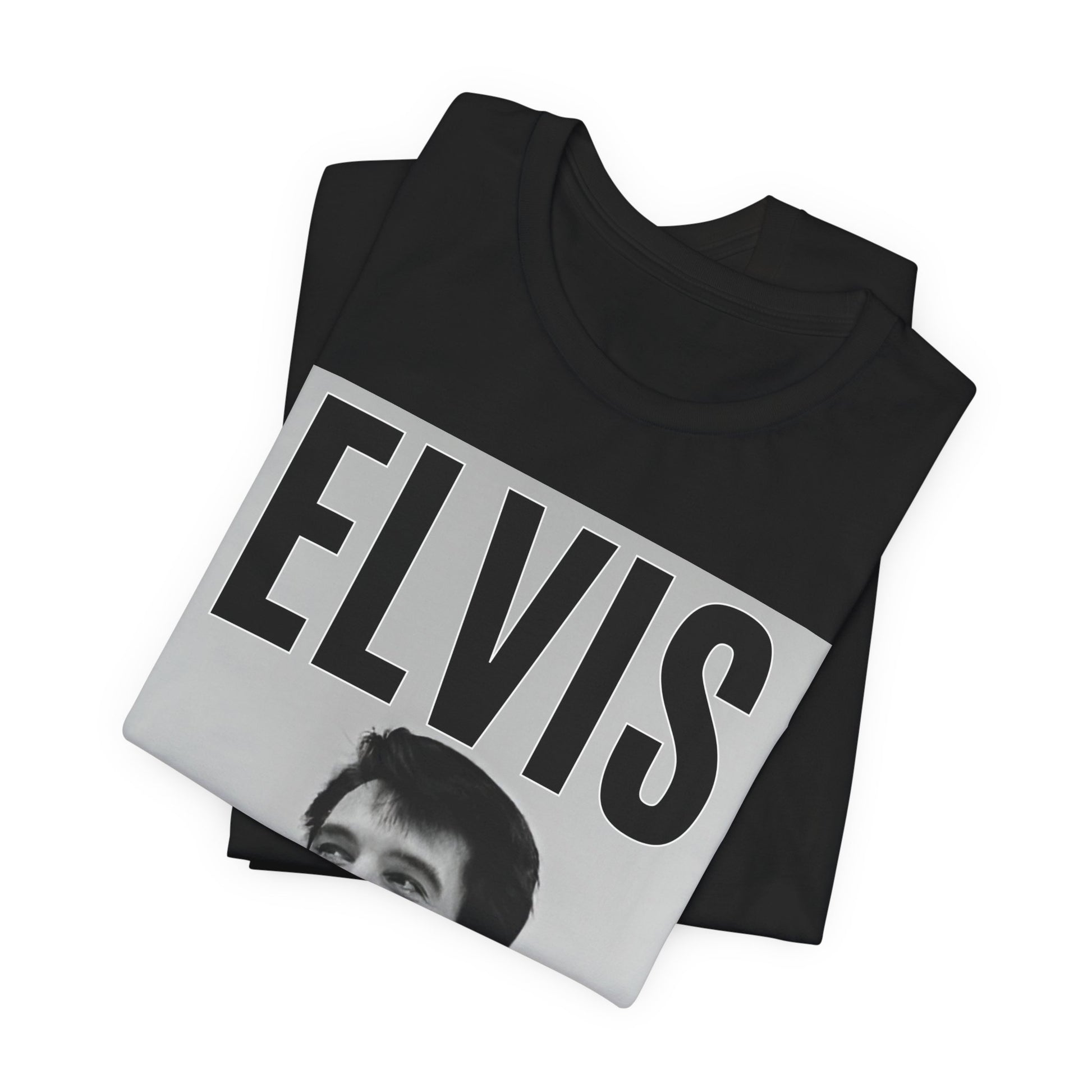 A black graphic t-shirt featuring a retro graphic of Elvis Presley as a 'Rebel With A Cause.'