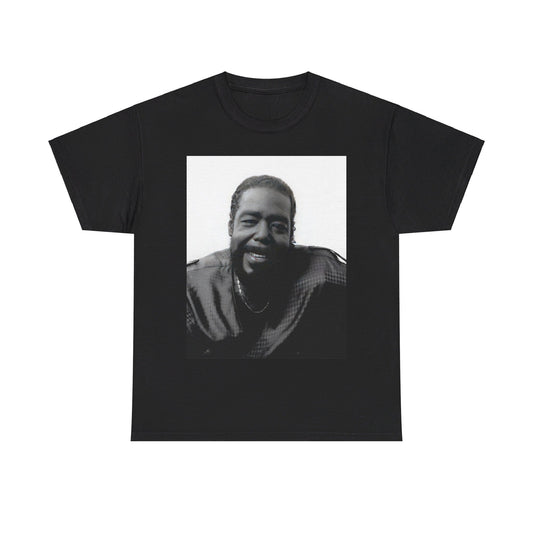 A black graphic t-shirt featuring a black and white photo of Barry White with his iconic smile.