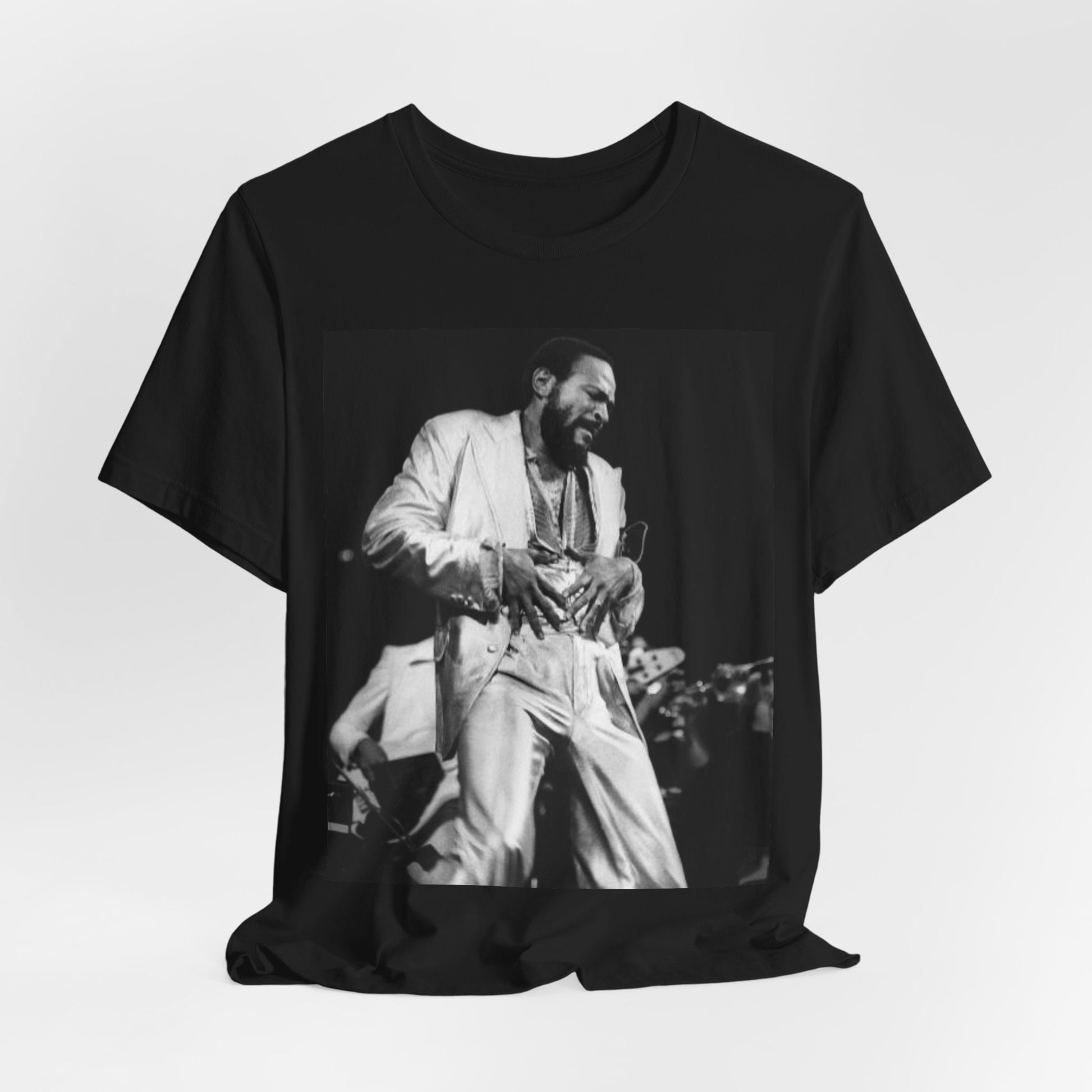 A black graphic t-shirt featuring a 70s Motown concert graphic of Marvin Gaye.