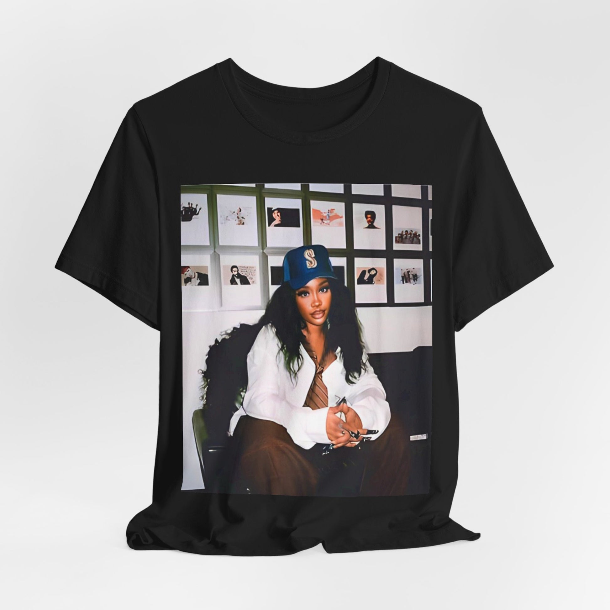 A black graphic t-shirt featuring a graphic related to SZA's 'Ctrl' album era.