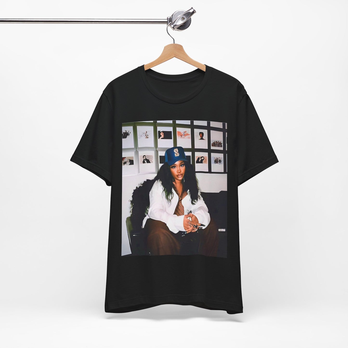 A black graphic t-shirt featuring a graphic related to SZA's 'Ctrl' album era.