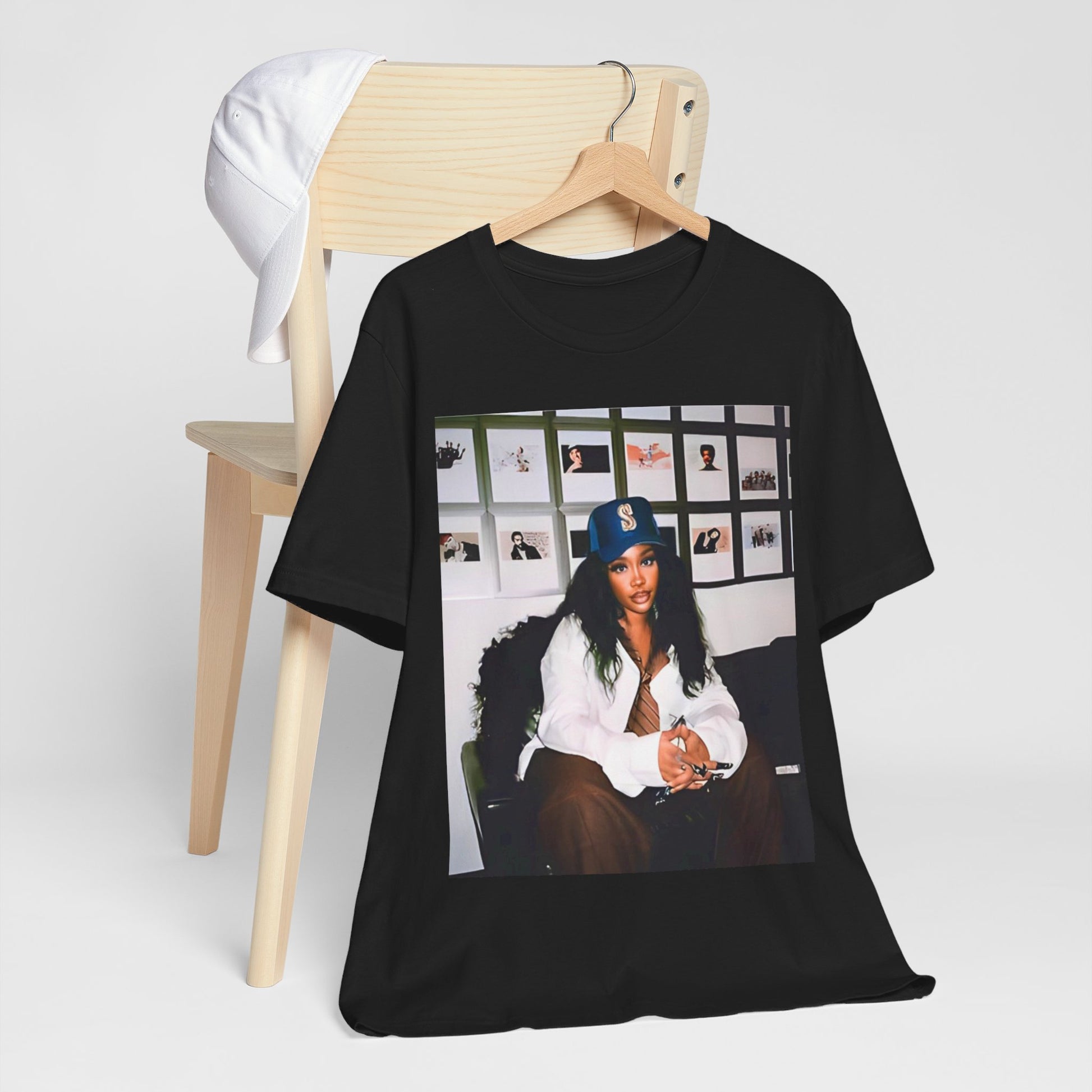 A black graphic t-shirt featuring a graphic related to SZA's 'Ctrl' album era.